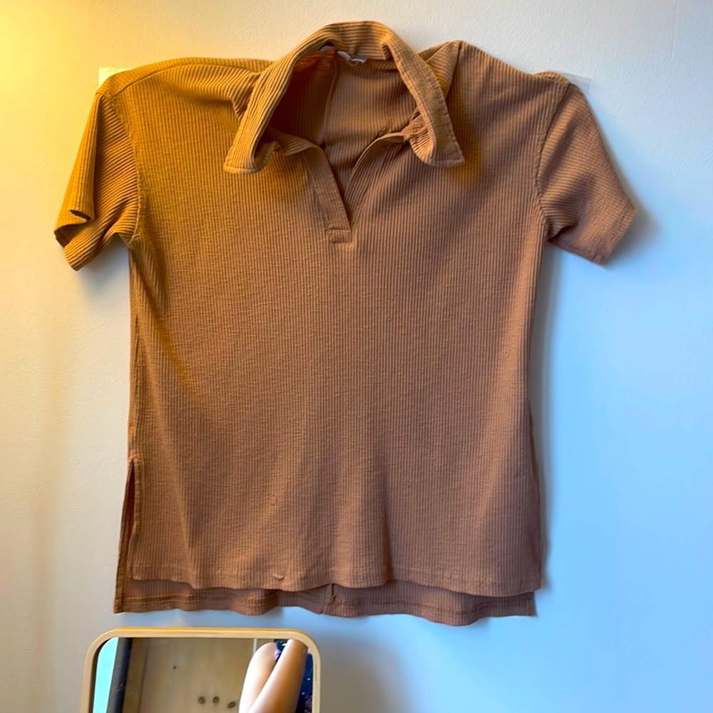 Oversized tan shirt. Supper chic collar. Looks better in real life.